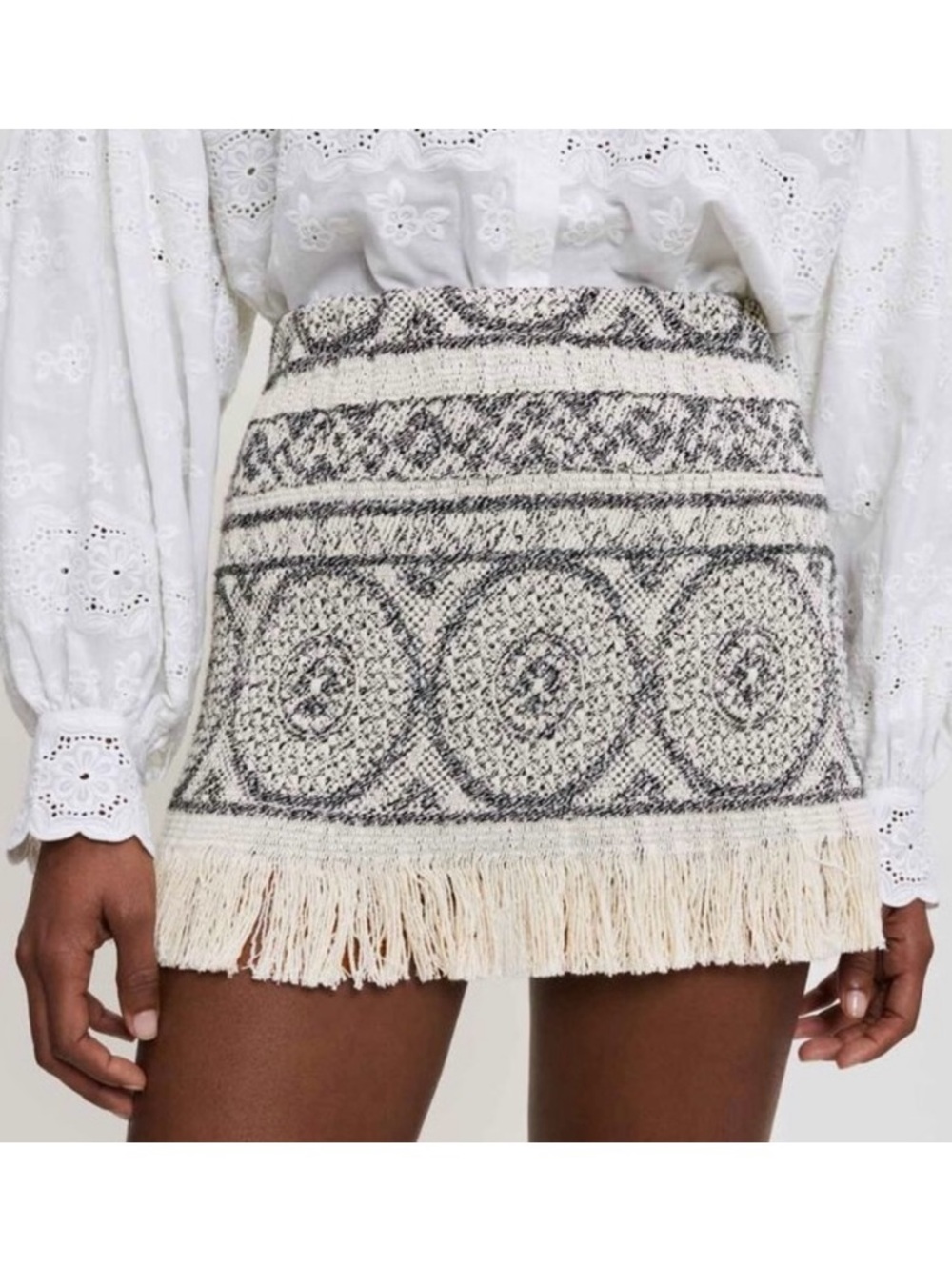 Maje lapiro miniskirt woven geometric design and fringe hem.